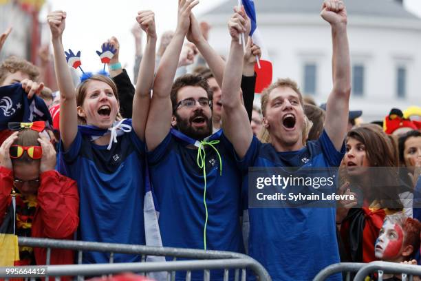 French soccer fans celebrate France winning after attending Belgium National team 'Les Diables Rouges' vs France National Team during FIFA WC 2018...