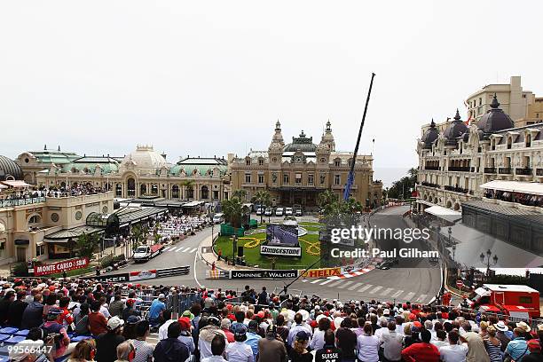 Nico Rosberg of Germany and Mercedes GP drives through Casino Square in the final practice session prior to qualifying for the Monaco Formula One...