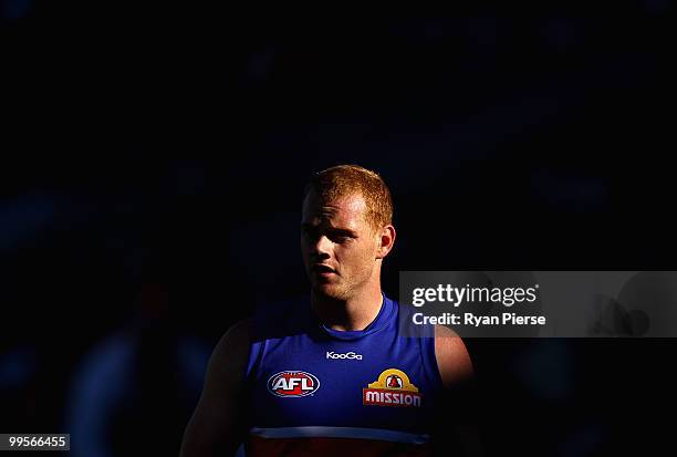 Adam Cooney of the Bulldogs looks on from the bench during the round eight AFL match between the Western Bulldogs and the Sydney Swans at Manuka Oval...