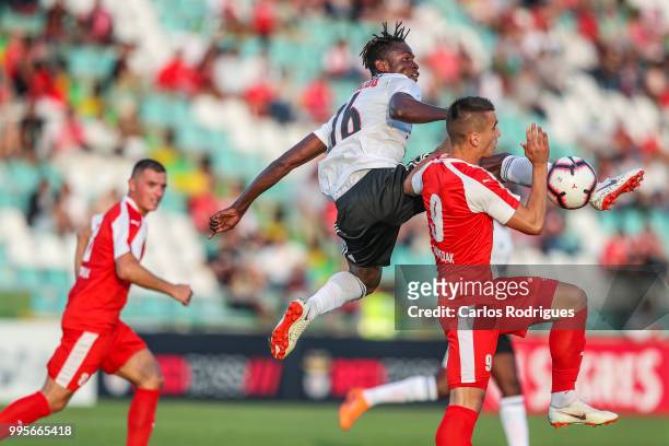 Benfica midfielder Alfa Semedo from Guinea Bissau vies with FK Napredak forward Anes Rusevic from Serbia for the ball possession during the Benfica v...