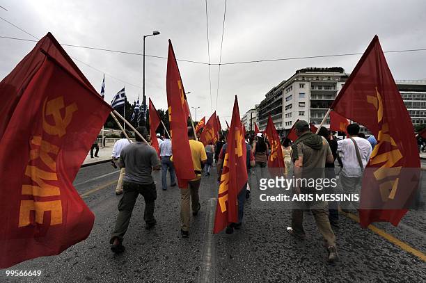 Communist demonstrators of the KKE march on May 15, 2010 in front of the Greek parliament in central Athens to protest against the Government's...