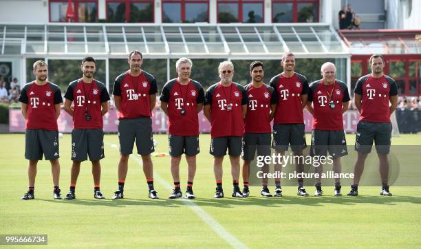 The new trainer team with goalkeeping coach Toni Tapalovic, co-trainer Hermann Gerland, head of health and fitness Holger Broich, dietician Mino...