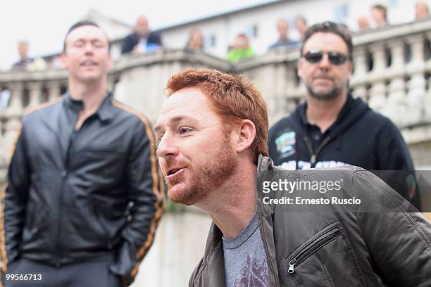 Russell Crowe, Kevin Durand and Scott Grimes perform unplugged in Piazza di Spagna on May 15, 2010 in Rome, Italy.