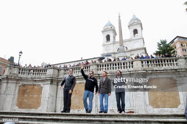 Russell Crowe, Alan Doyle, Kevin Durand and Scott Grimes perform unplugged in Piazza di Spagna on May 15, 2010 in Rome, Italy.