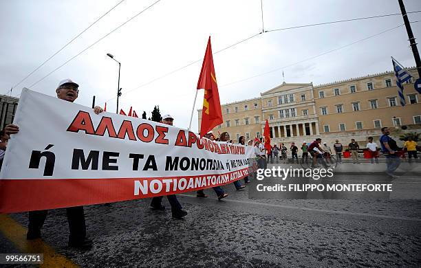 Communist demonstrators of the KKE march through the streets in central Athens on May 14, 2010 to protest against the Government. The austerity...