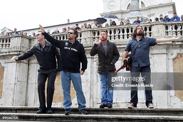 Russell Crowe, Alan Doyle, Kevin Durand and Scott Grimes perform unplugged in Piazza di Spagna on May 15, 2010 in Rome, Italy.