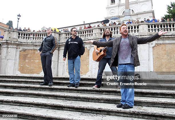 Russell Crowe, Alan Doyle, Kevin Durand and Scott Grimes perform unplugged in Piazza di Spagna on May 15, 2010 in Rome, Italy.