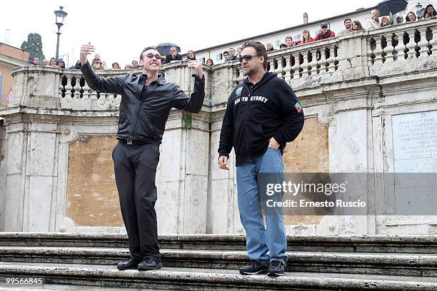 Russell Crowe and Kevin Durand perform unplugged in Piazza di Spagna on May 15, 2010 in Rome, Italy.