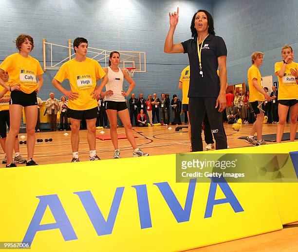 Dame Kelly Holmes with athletes during the Aviva sponsored mentoring day for young athletes at Loughborough College on May 15, 2010 in Loughborough,...