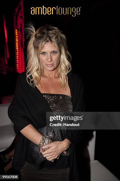 In this handout image provided by Amber Lounge, Rachel Hunter attends the Amber Lounge party held at Meridian Beach Plaza on May 15th, 2010 in Monte...