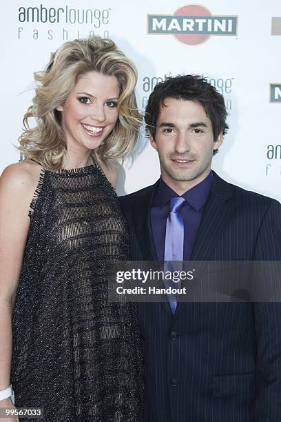 In this handout image provided by Amber Lounge, Timo Glock and Isabell Reis attend the Amber Lounge party held at Meridien Beach Plaza on May 15th,...