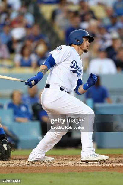 Yasmani Grandal of the Los Angeles Dodgers bats during the game against the Chicago Cubs at Dodger Stadium on June 27, 2018 in Los Angeles,...