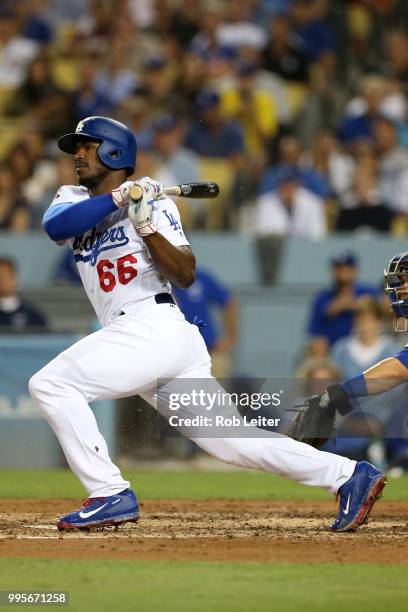 Yasiel Puig of the Los Angeles Dodgers bats during the game against the Chicago Cubs at Dodger Stadium on June 27, 2018 in Los Angeles, California....