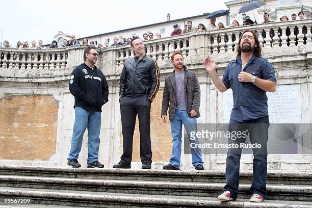 Russell Crowe, Alan Doyle, Kevin Durand and Scott Grimes perform unplugged in Piazza di Spagna on May 15, 2010 in Rome, Italy.