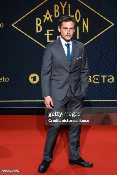 Actor Volker Bruch arrives, walking over the red carpet for the premiere of the TV series "Babylon Berlin" of the channel ARD, in Berlin, Germany, 28...