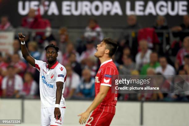 Belgrade's Richmond Boakye cheers over his 0-1 score during the Europa League match between 1.FC Cologne vs. Red Star Belgrade at the...