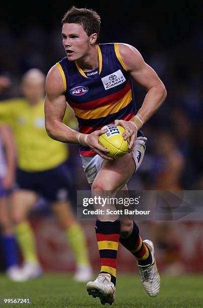 Patrick Dangerfield of the Crows runs with the ball during the round eight AFL match between the North Melbourne Kangaroos and the Adelaide Crows at...