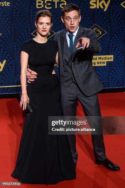 Dpatop - Actors Liv Lisa Fries and Volker Bruch arrive, walking over the red carpet for the premiere of the TV series "Babylon Berlin" of the channel...