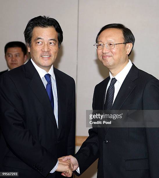 Foreign Ministers Katsuya Okada of Japan and Yang Jiechi of China shake hands prior to their meeting on May 15, 2010 in Gyeongju, South Korea....