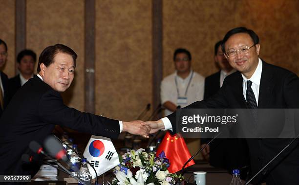 Foreign Ministers Yu Myung-hwan of South Korean and Yang Jiechi of China shake hands prior to their meeting on May 15, 2010 in Gyeongju, South Korea....