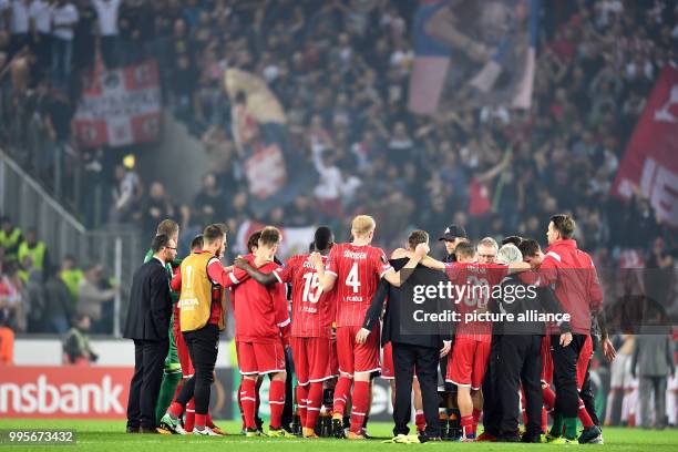 Cologne's team stands defeated after the Europa League match between 1.FC Cologne vs. Red Star Belgrade at the RheinEnergieStadium in Cologne,...