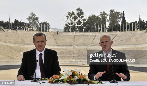 Turkish Prime minister Recep Tayyip Erdogan listens to his Greek counterpart George Papandreou on May 15, 2010 at the panathenian all-marble stadium...