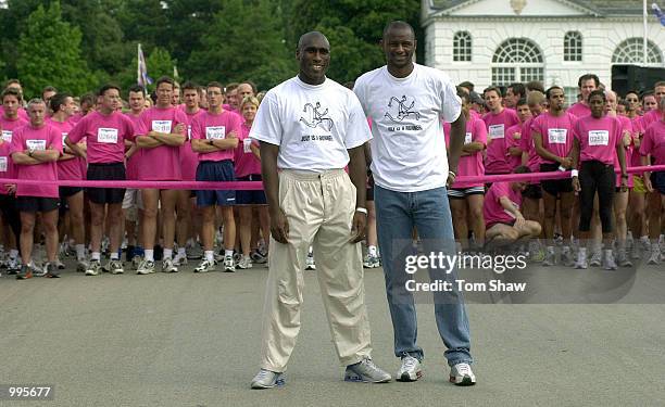 Patrick Vieira and Sol Campbell of Arsenal prepare to fire the gun at the start of the Nike 10k run at Kew Gardens, London. Sol Campbell said of the...