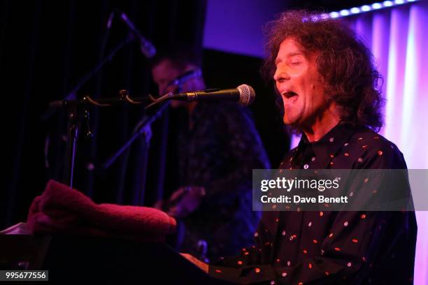 Gilbert O'Sullivan performs on stage during the Gilbert O'Sullivan showcase performance at 100 Wardour St on July 10, 2018 in London, England.