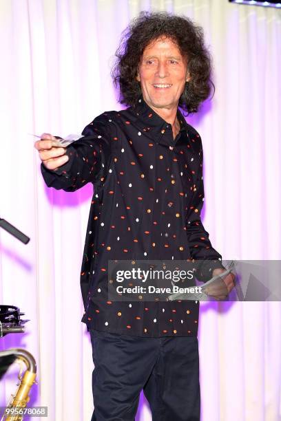 Gilbert O'Sullivan performs on stage during the Gilbert O'Sullivan showcase performance at 100 Wardour St on July 10, 2018 in London, England.