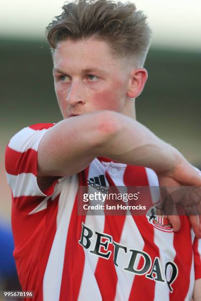 Denver Hume of Sunderland dries his sweat during a pre-season friendly game between Darlington FC and Sunderland AFC at Blackwell Meadows on July 10,...