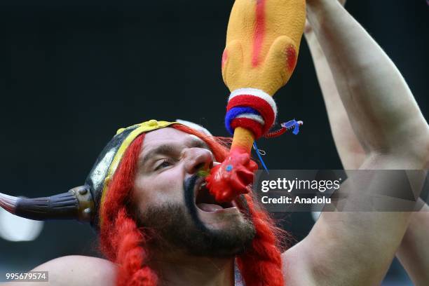 Fan is seen ahead of the 2018 FIFA World Cup Russia semi final match between France and Belgium at the Saint Petersburg Stadium in Saint Petersburg,...