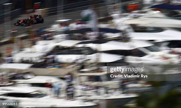 Sebastien Buemi of Switzerland and Scuderia Toro Rosso drives during qualifying for the Monaco Formula One Grand Prix at the Monte Carlo Circuit on...