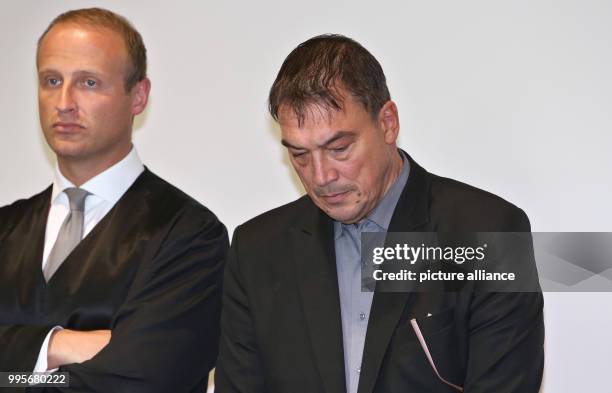 Linus Foerster stands next to his lawyer Hans Joerg Schmied in the court room of the district court in Augsburg, Germany, 29 September 2017. The...