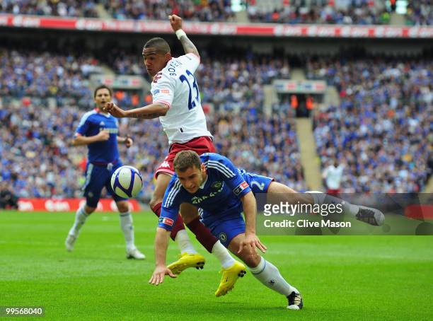 Branislav Ivanovic of Chelsea tangles with Kevin-Prince Boateng of Portsmouth during the FA Cup sponsored by E.ON Final match between Chelsea and...
