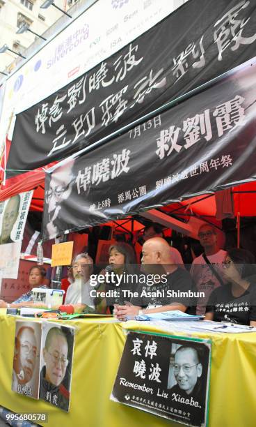 Supporters of late Chinese activist Liu Xiaobo attend a press conference after his wife Liu Xia left China for Germany on July 10, 2018 in Hong Kong.