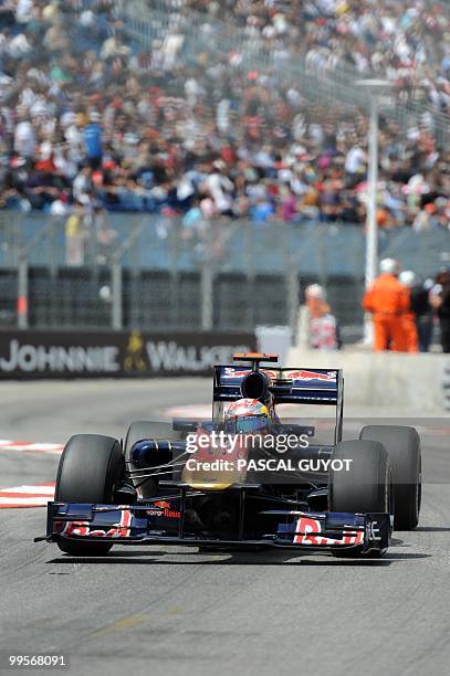 Toro Rosso's Swiss driver Sebastien Buemi drives at the Monaco street circuit on May 15 during the qualifying session of the Monaco Formula One Grand...