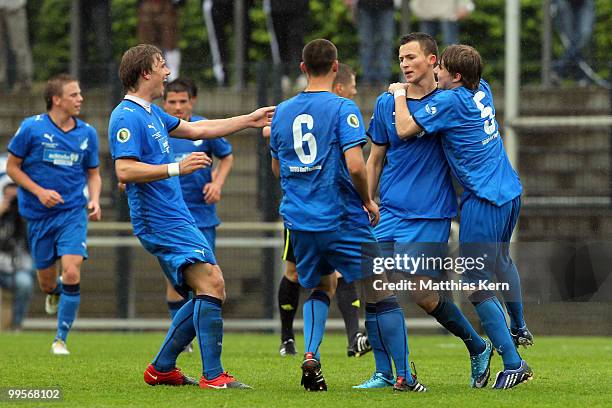 Denis Thomalla of Hoffenheim jubilates with team mates after scoring the third goal during the DFB Junior Cup Final match between 1899 Hoffenheim and...