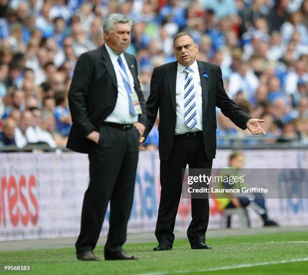 Chelsea Manager Carlo Ancelotti and Portsmouth Manager Avram Grant watch the action during the FA Cup sponsored by E.ON Final match between Chelsea...