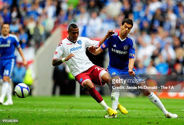 Kevin-Prince Boateng of Portsmouth fouls Michael Ballack of Chelsea during the FA Cup sponsored by E.ON Final match between Chelsea and Portsmouth at...