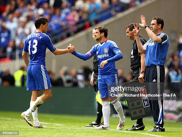 Michael Ballack of Chelsea is substituted for Juliano Belletti of Chelsea due to injury during the FA Cup sponsored by E.ON Final match between...