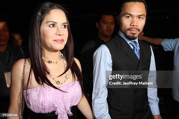 World welterweight boxing champion Manny Pacquiao and wife Jinkee Pacquiao arrive at the KCC Mall on May 15, 2010 in General Santos, Philippines....