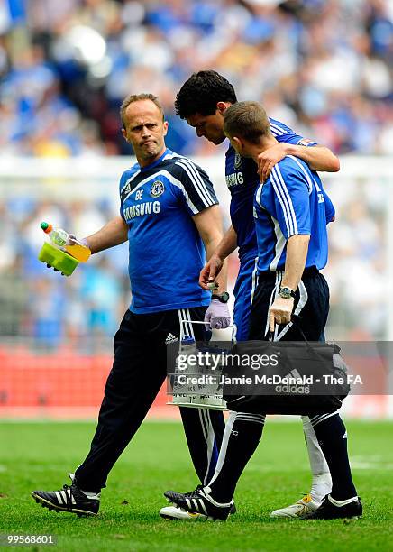 Michael Ballack of Chelsea leaves the field injured during the FA Cup sponsored by E.ON Final match between Chelsea and Portsmouth at Wembley Stadium...