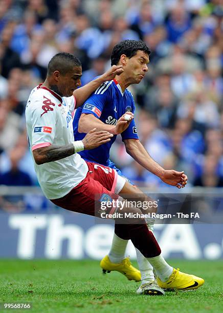 Michael Ballack of Chelsea is fouled by Kevin-Prince Boateng of Portsmouth during the FA Cup sponsored by E.ON Final match between Chelsea and...