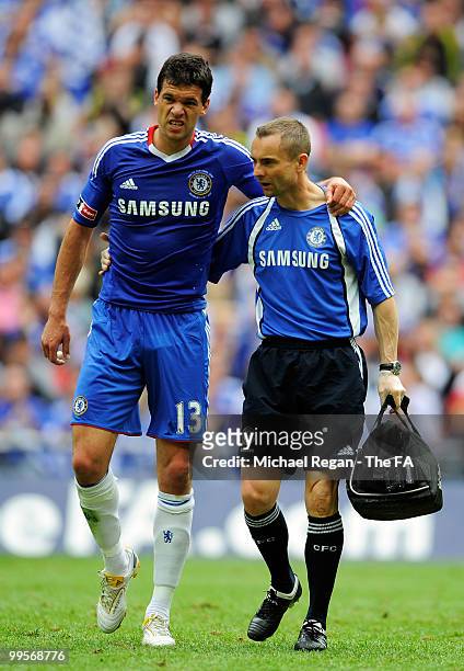 Michael Ballack of Chelsea is helped off the field follwoing his injury during the FA Cup sponsored by E.ON Final match between Chelsea and...