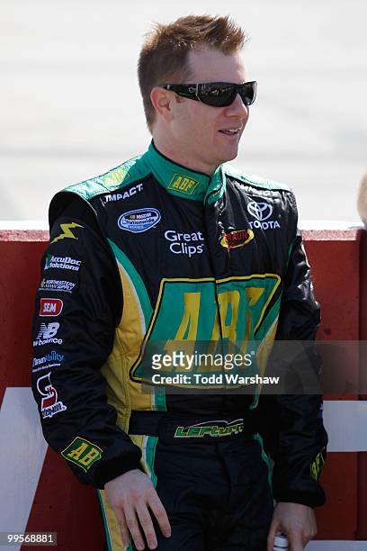 Jason Leffler, driver of the ABF Freight Toyota, stands on the grid during qualifying for the NASCAR Nationwide Series Heluva Good 200 at Dover...