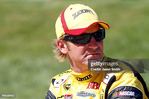 Clint Bowyer, driver of the Zaxby's Chevrolet, stands on the grid during qualifying for the NASCAR Nationwide Series Heluva Good 200 at Dover...