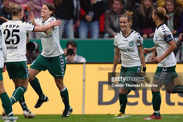 Alexandra Popp, Annike Krahn, Simone Laudehr and Inka Grings of Duisburg celebrate their first goal during the DFB Women's Cup final match between...