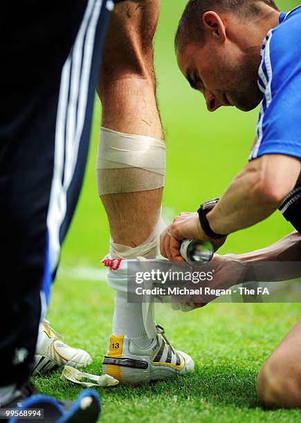 Michael Ballack of Chelsea receives treatment on an injury during the FA Cup sponsored by E.ON Final match between Chelsea and Portsmouth at Wembley...