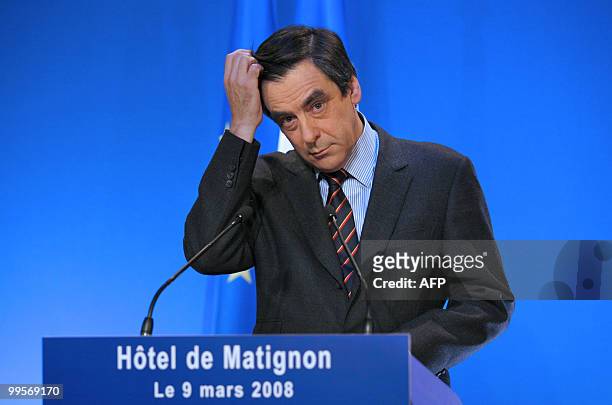 French Prime Minister Francois Fillon gestures before giving a televised speech on March 9, 2008 at the Matignon hotel in Paris. The Government...