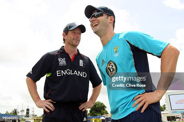 Paul Collingwood of England and Michael Clarke of Australia share a joke during a photocall ahead of the ICC World Twenty20 Final at the Kensington...